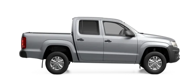 Volkswagen Amarok Trendline, color gris, de perfil, lado derecho. Sobre un fondo blanco.